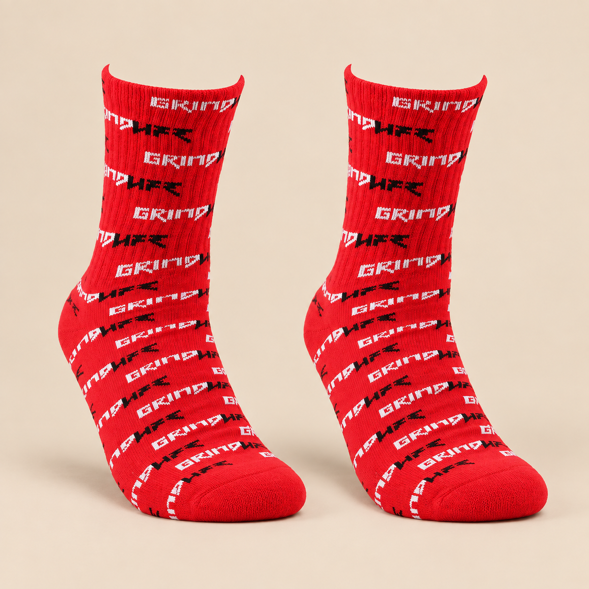 Red Archive Grind socks on a warm Grind Cream studio background