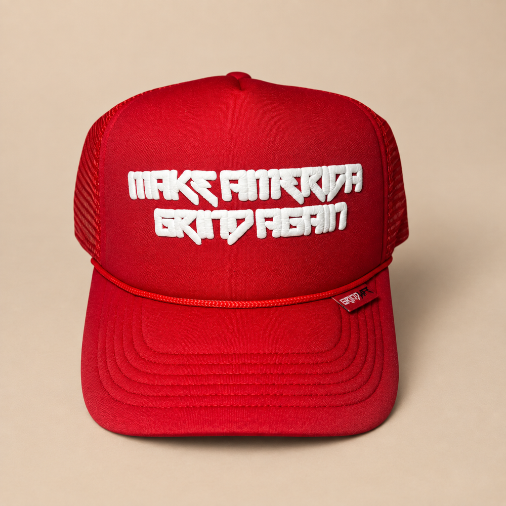 Front view of red Make America Grind Again Collector’s Edition trucker hat